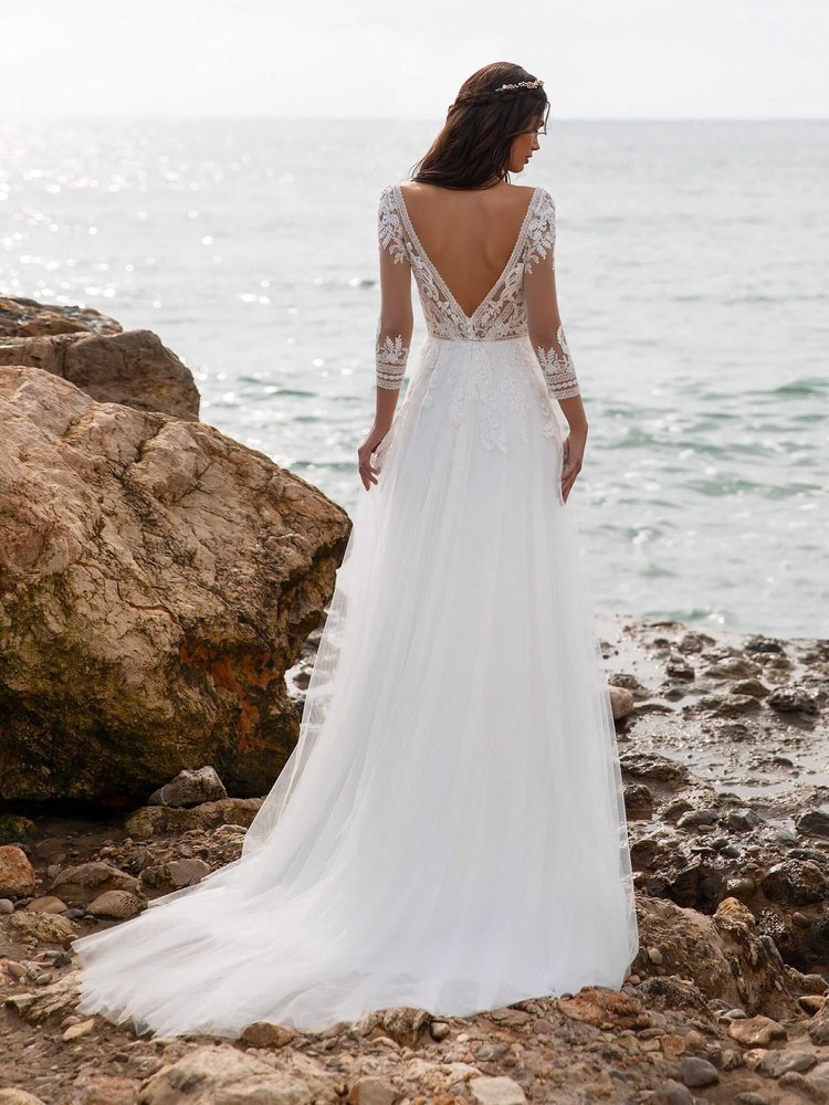 evaluate the bridal retail company pronovias on beach wedding dresses Pronovias: Bale main image 0