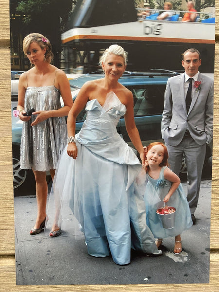 Bride stuns in gold draped Baroque-inspired gown by Vivienne Westwood